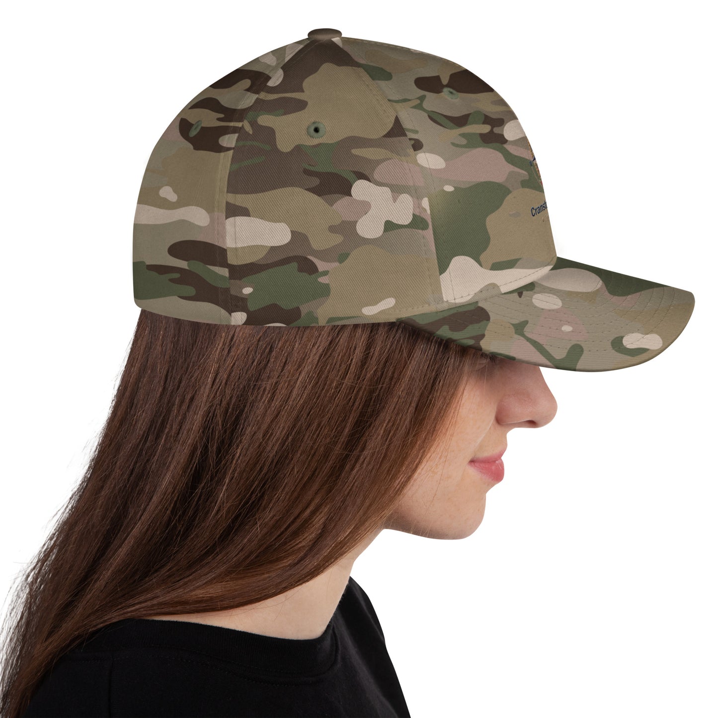 Camouflage twill baseball cap with long curved brim, side view