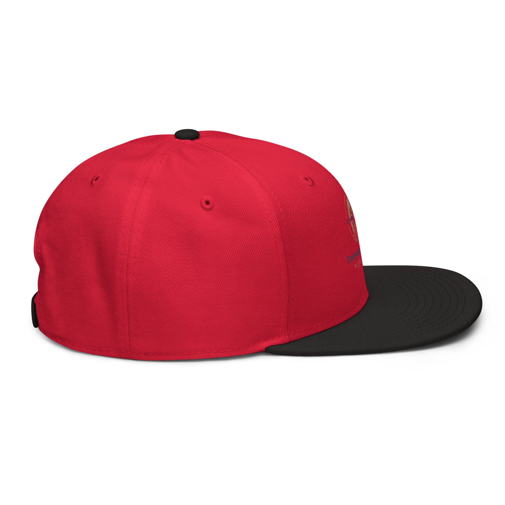 Snapback hat with red crown and black brim, side view showing stitched seams