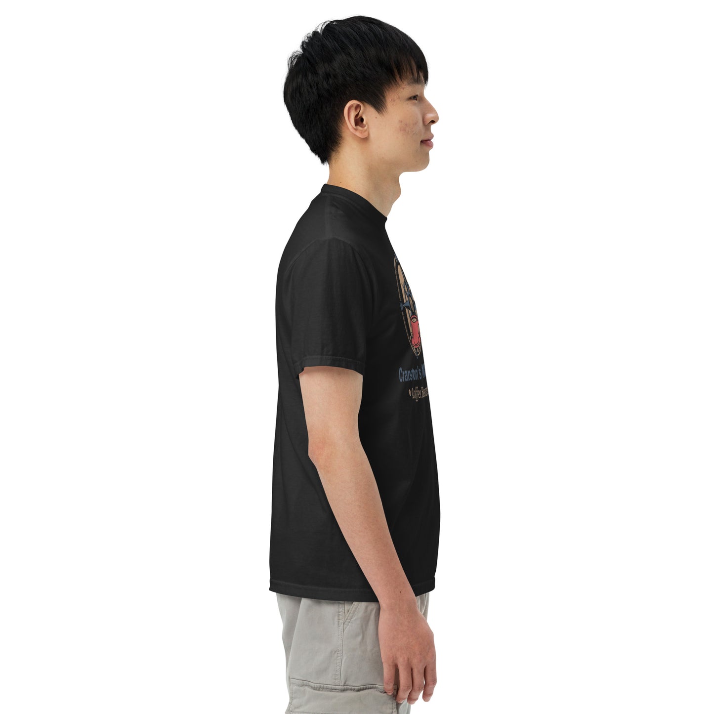 Black unisex heavyweight T-shirt in left profile with partial front print, crew neck