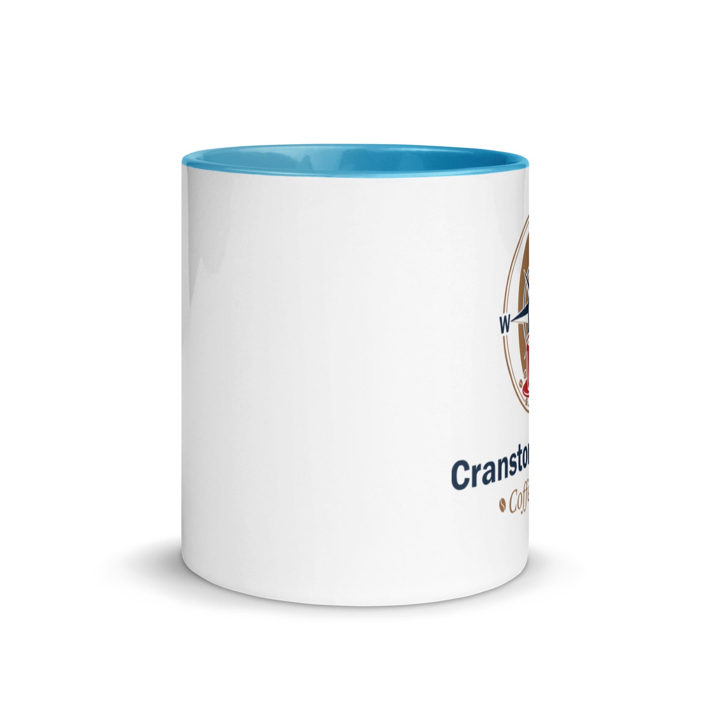 White ceramic mug with blue interior rim and partial printed logo