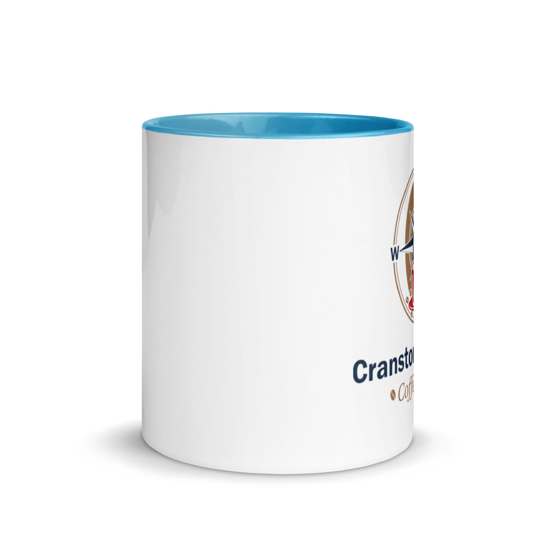 White ceramic mug with blue interior rim and partial printed logo
