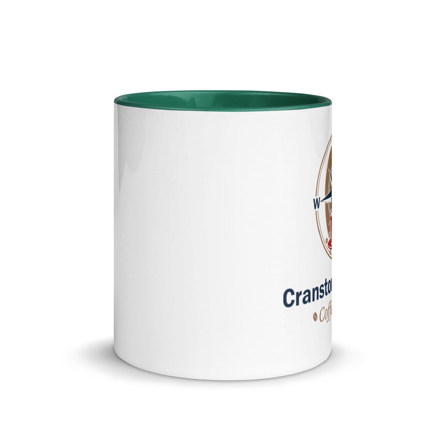 White ceramic mug with green interior rim and partial printed logo