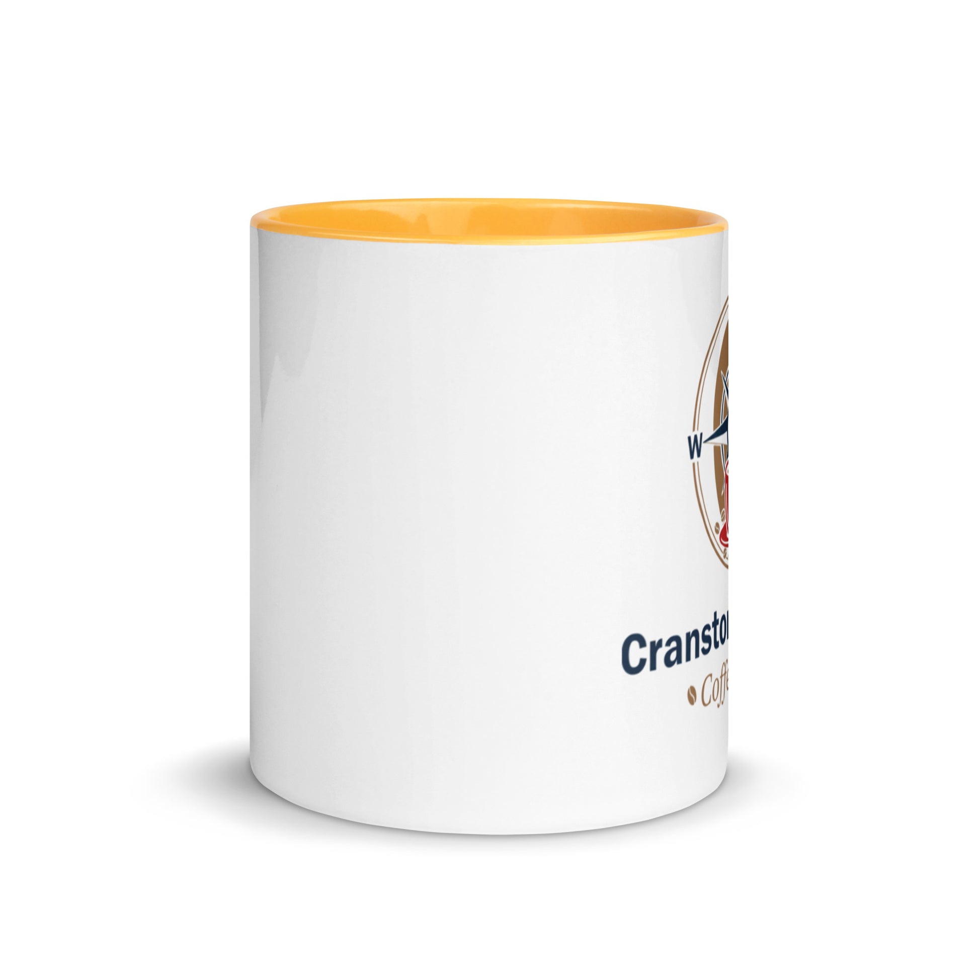 White ceramic mug with orange interior; partial printed logo on the side.