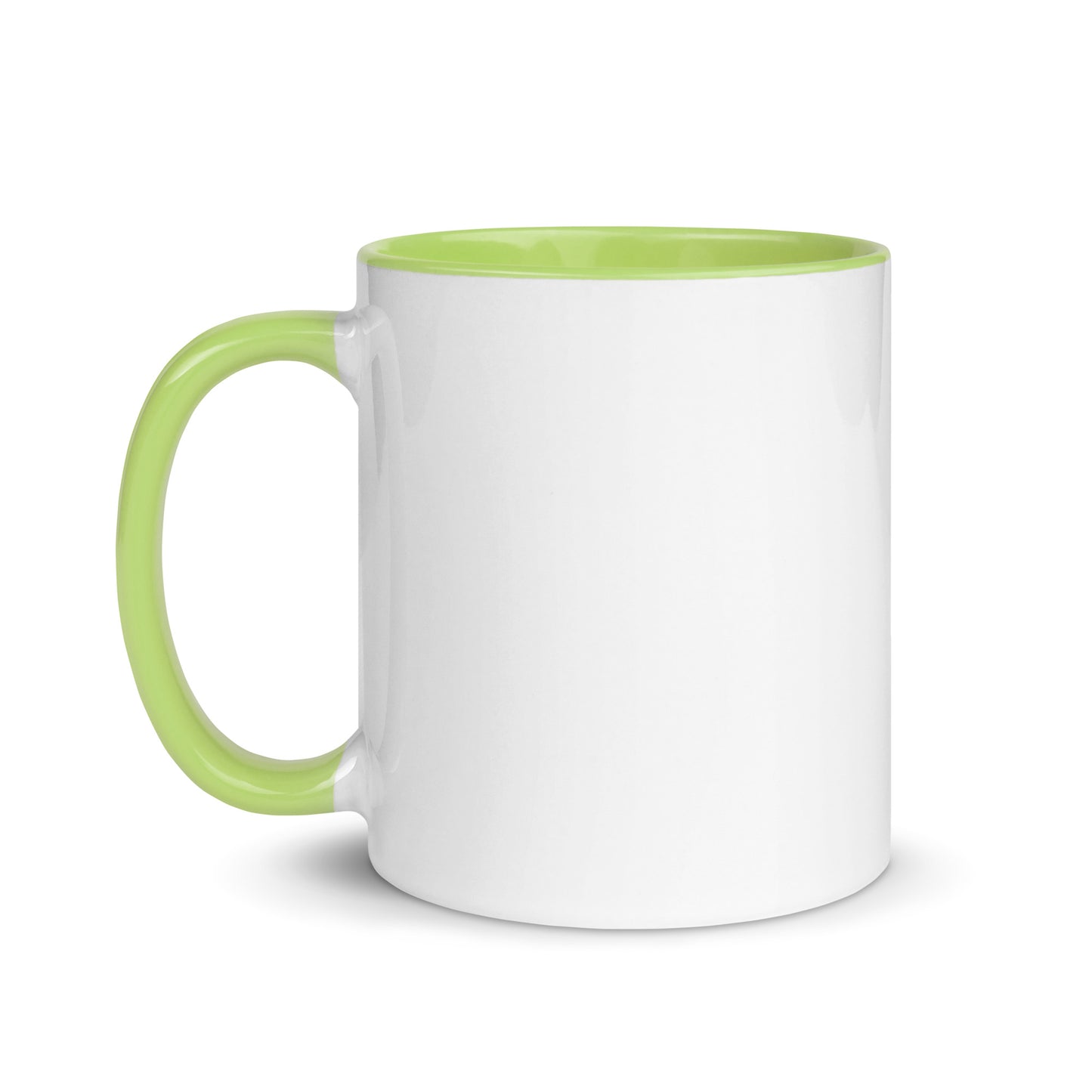 White ceramic mug with green interior and green handle.