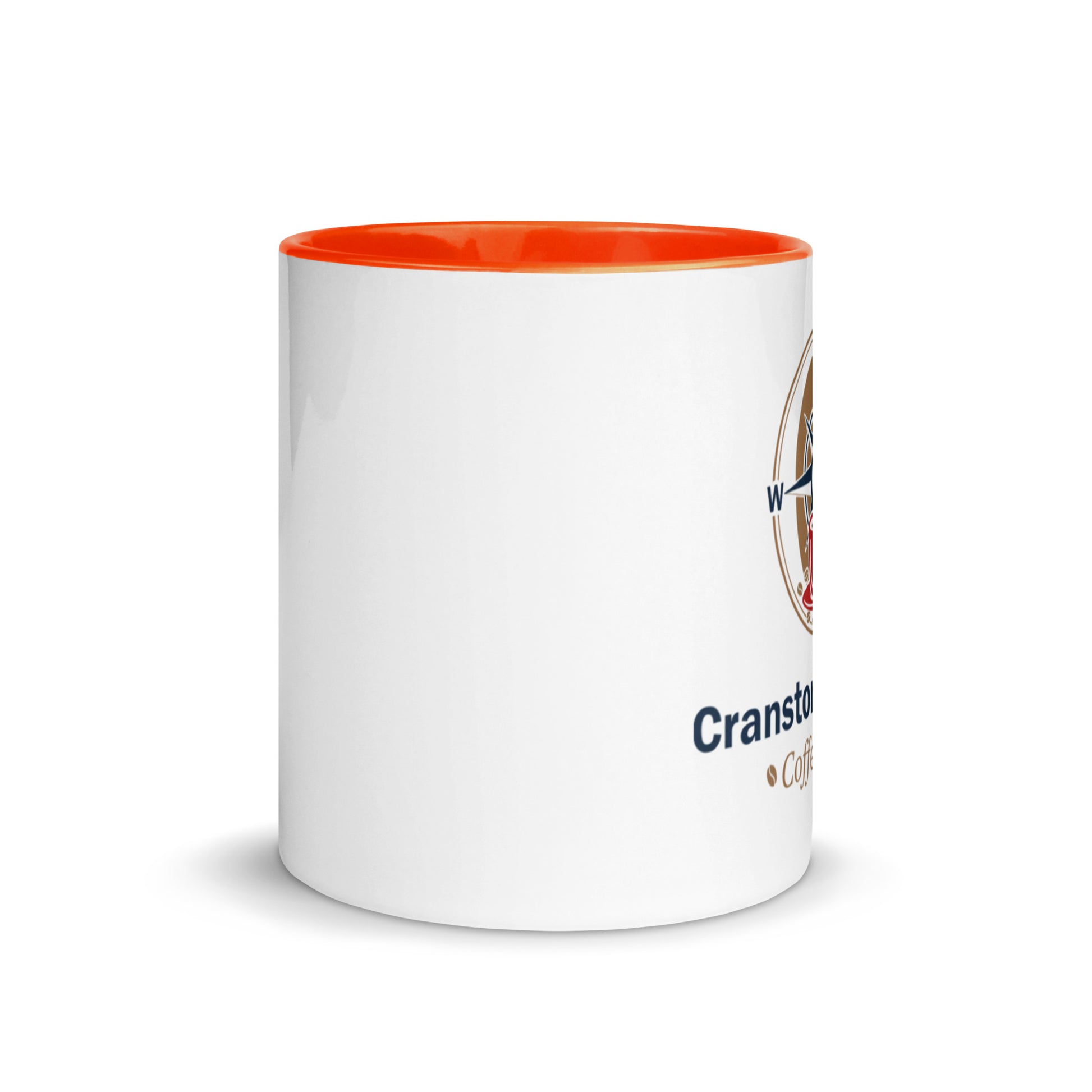 White ceramic mug with orange interior rim and partial printed logo