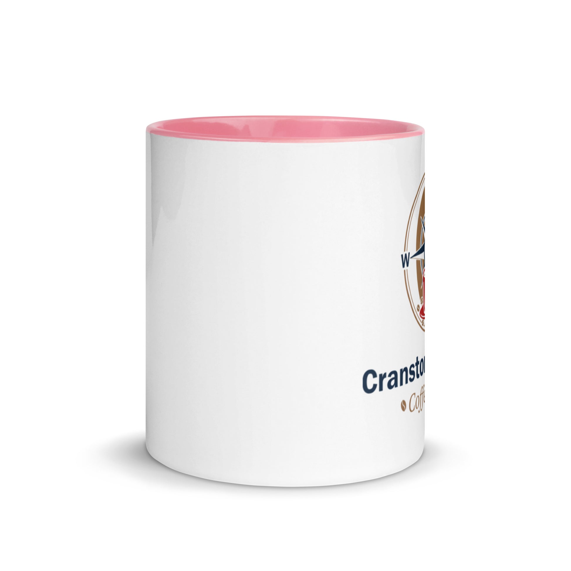 White ceramic mug with pink interior; partial printed logo on the side.