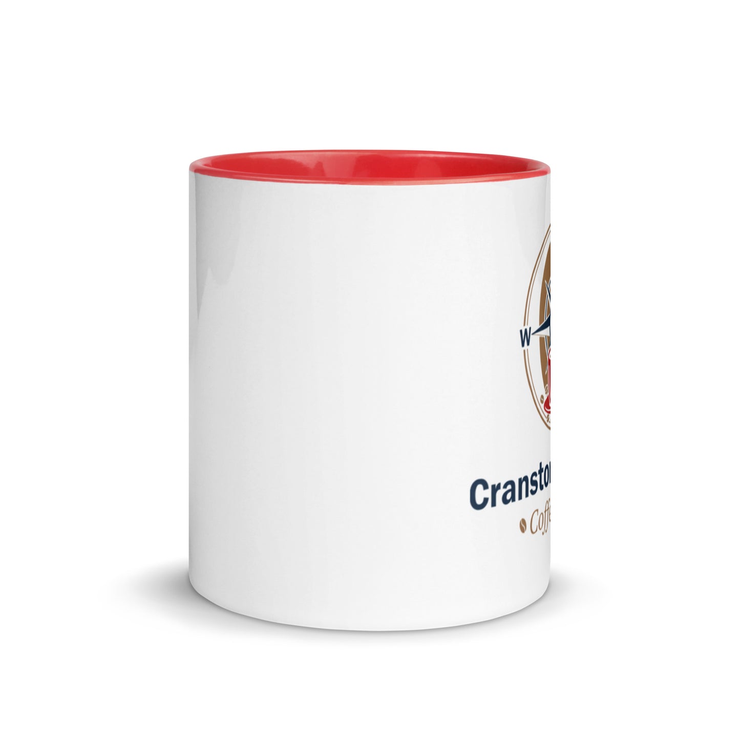 White ceramic mug with red interior rim and partial printed logo