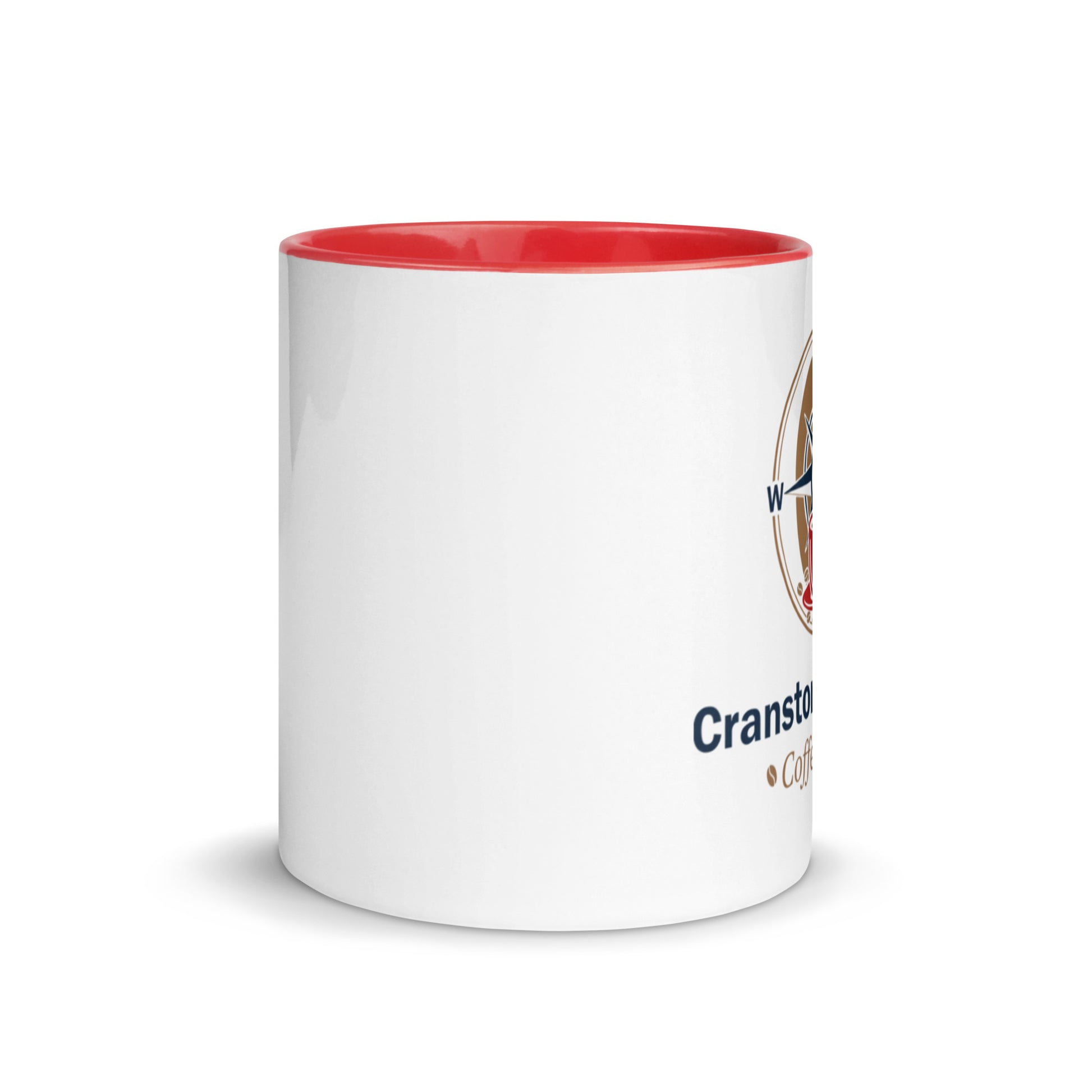 White ceramic mug with red interior rim and partial printed logo